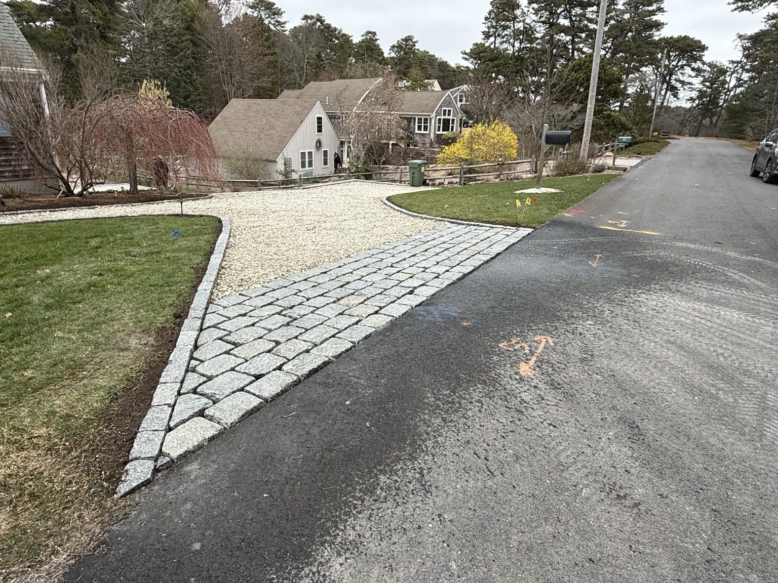 Cobblestone driveway apron and gravel driveway